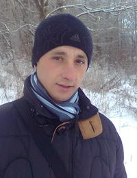 Роман Полукішник